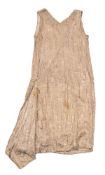 An early 20th century gold cotton and beadwork dress: no label.