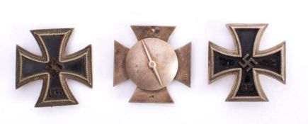 A Third Reich period 1939 Iron Cross: 1st Class, stamped L52/20, a similar 1393 Iron Cross,