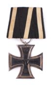 An Imperial German 1914 Iron Cross: 2nd Class, with ribbon and backing plate unmarked.
