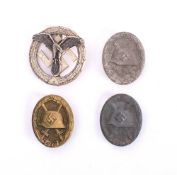 A reproduction NSKK Motor Sports badge: together with three reproduction German Wound badges (4) *