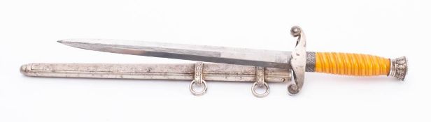 A German Third Reich Army Officers Dagger by Eickhorn: the straight double edge blade with makers