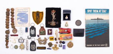 A collection of various military buttons and enamel badges etc: * Notes Militaria artefacts are