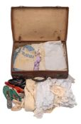 A collection of Edwardian and later christening gowns and children's whitewear: including several