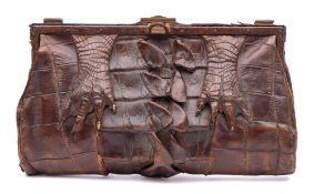An early 20th century brown crocodile skin handbag: ( poor condition) together with a pair of mid