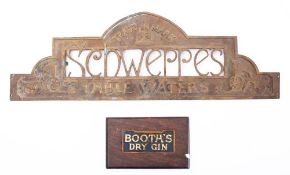 A late 19th/early 20th century brass 'Schweppes Table Waters' sign: with lancet arch and trade mark,