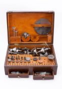 A mid 20th century watchmaker's lathe, unsigned: with 3 1/2 inch headstock spindle,