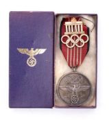 A Third Reich period 1936 Berlin Olympic Games silvered medal: for meritorious cooperation at the