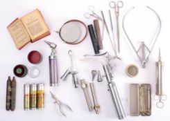 A small group of Obstetric medical instruments: together with a copy of 'The Works of Aristotle.
