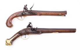 An Indian flintlock pistol: 10 1/4 inch barrel, side lock action and brass fittings,