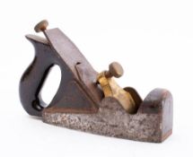 A Norris smoother stamped 'Norris, London': mahogany infill and closed handle,
