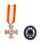 Order of The Red Eagle medal: fifth Class, together with a German WWI wounds badge.