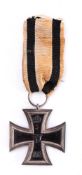 An Imperial German 1914 Iron Cross: 2nd Class, with ribbon stamped 'M' to the suspension ring.