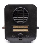 An Ecko Type AC74 Superhet radio receiver in black Bakelite Art Deco style case:,
