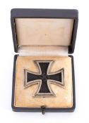 A Third Reich period Iron Cross: 1st Class, stamped 65 to the pin, contained in its case of issue.