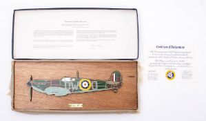 A boxed group of three Battle of Britain Commemorative wall plaques: comprising Spitfire,