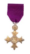 A George V M. B. E. : hallmarked for London, 1918, incorrect ribbon.