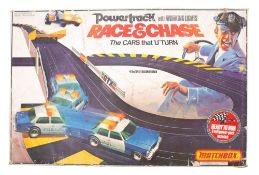 Matchbox Powertrack 'Race & Chase' Slot car set: with Corvette Stingray and Police car,