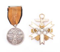 A Third Reich period 1936 Berlin Olympic Games silvered medal: for meritorious cooperation at the