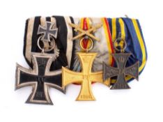 An Imperial German WWI trio includes 1914 Iron Cross: 2nd Class,