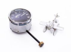 A Jaeger dashboard seven day timepiece from a 1933 Rover saloon: together with a Schneider Trophy