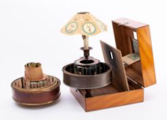 A late 19th/ early 20th century mahogany cased Praxinoscope Theatre by Charles-Emile Reynaud: the