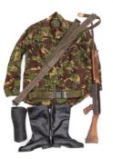 A NATO Camouflage Combat Smock: together with a pair of black leather boots,