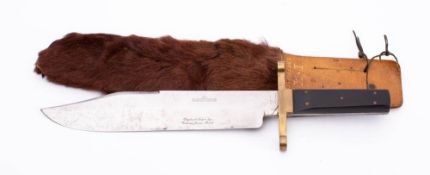 A large 'I XL' Bowie knife by G Wostenholm & Son,Sheffield: , clipped back blade ,