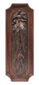 A cast iron wall relief of a brace of sturgeon, late 19th century,: with three smaller fish,