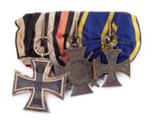 An Imperial German WWI trio includes 1914 Iron Cross: 2nd Class,