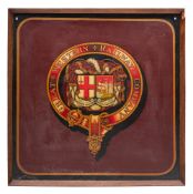 A framed GWR passenger coach armorial: the transfer armorial on a burgundy ground with gold and
