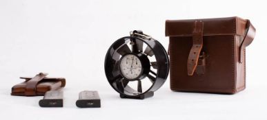 A brown leather pistol clip pouch with two empty clips: unsigned,