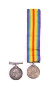 Two WWI War Medals: '430780 Pte H Peskett 10-Can Inf' 'SS 107586 R W Holmes L Sto RN'.