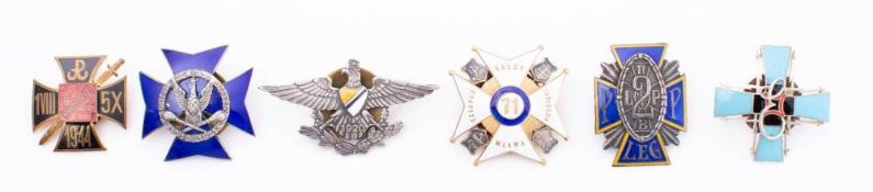 A collection of Polish metal and enamel Regimental association badges: includes 71st Regiment,