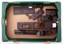 A group of eight various wooden planes: including a drop handle jack plane,