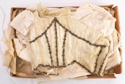 A Victorian and later cream silk wedding dress: the main one piece cream silk dress with long