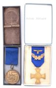 A German Armed Forces 40 Year Long Service Medal: 25 year cross with additional oakleaves and eagle