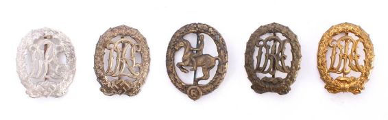 A collection of German Third Reich style DRA and DRL Sports Medals: including bronze,