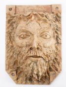 A Lonkey Moor Pottery 'Green Man' wall mask pocket: stamped as per title, 32 x 21.5cm.