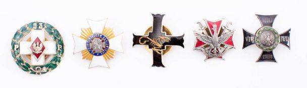 A collection of Polish metal and enamel Regimental association badges: includes 53rd Infantry