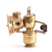 A Lucas Aceta Major brass carbide bicycle lamp: the 3 inch lens with red and green side lenses.