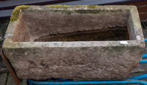 A rough hewn rectangular stone trough, 18th/ 19th century;: 28cm high, 73cm long, 38cm wide.