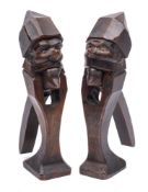 A pair of Bavarian carved and stained wood nutcrackers modelled as gnomes, circa 1900,