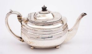 A George III silver teapot, maker Peter & William Bateman, London, 1811: of barge-shaped outline,