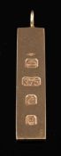 A 9 carat gold ingot pendant,