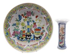 A Chinese porcelain vase and plate: the former of trumpet shaped form decorated in under glaze blue