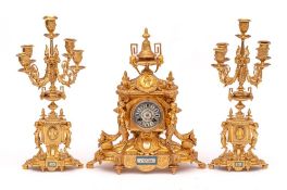 A French ormolu and Sevres clock garniture: the eight-day duration movement striking the hours and