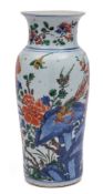 A Chinese wucai sleeve vase: of shaped cylindrical form with flared rim,