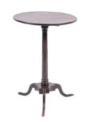 A George II oak tripod table, mid 18th century,