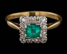 An emerald and diamond ring,