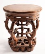 An unusual Chinese hardwood stand: with pierced frieze,